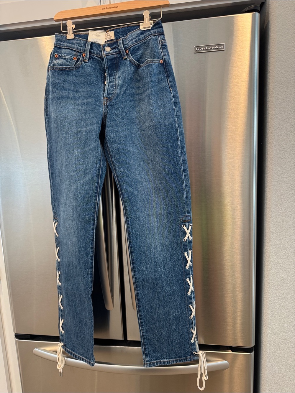 Beyoncé × Levi's 501 Curve Jeans featuring distinct white lace-up side seams